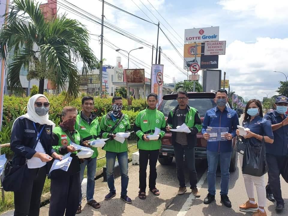 Nasdem Sumsel Bagikan 1000 Nasi Kotak dan Hand Sanitizer